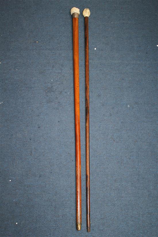 A Victorian ivory topped walking cane, largest 36.5in. (4)